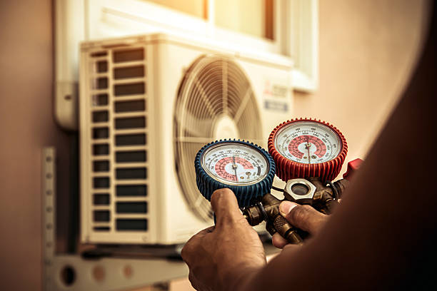 Professional Hvac technician working in Hackett, AR